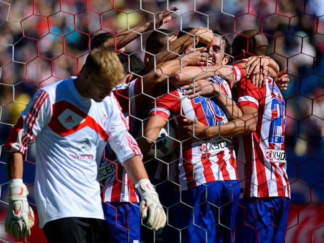 Atletico Madrid celebrate their opening goal