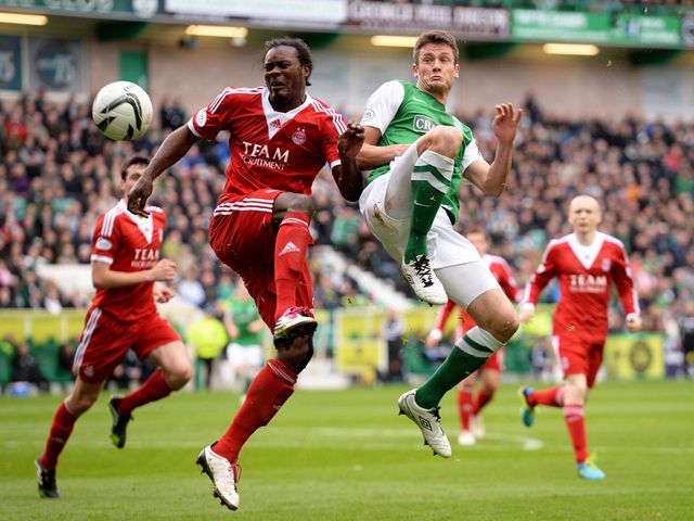 Calvin Zola and Owain Tudur-Jones tangle.