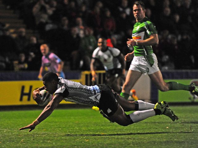 Kevin Naiqama dives over to score against Ireland