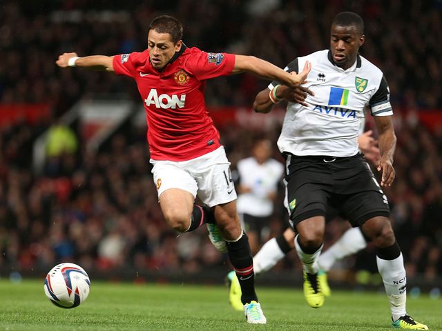 Hernandez gets away from Bassong