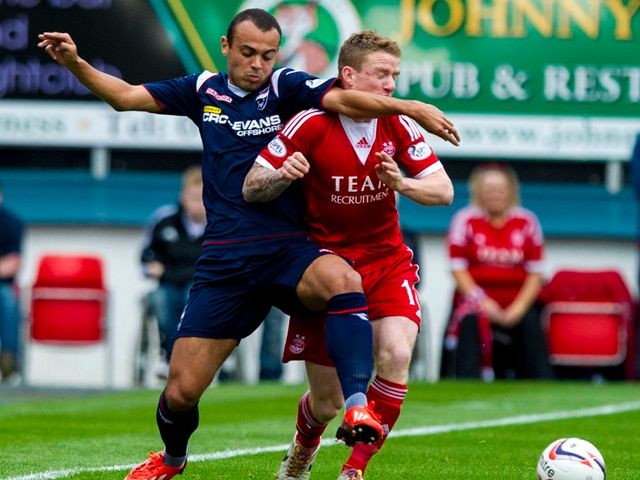 Ben Gordon tussles for the ball with Aberdeen's Jonny Hayes