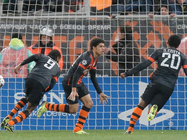 Taison celebrates his equaliser for the hosts