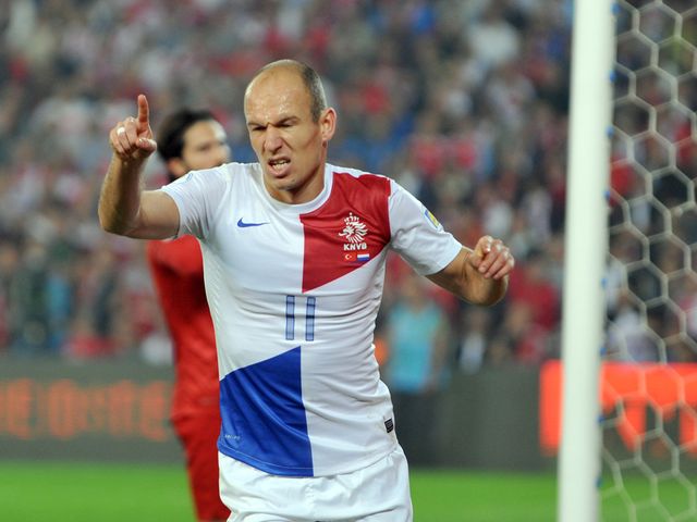 Arjen Robben celebrates his goal for the Dutch