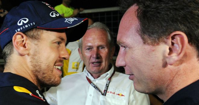 Sebastian Vettel and Christian Horner at Suzuka, as Helmut Marko looks on