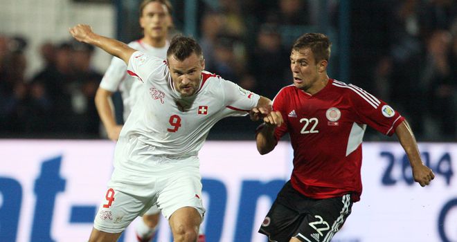 Haris Seferovic holds off Amir Abrashi