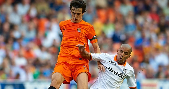 Real Sociedad goalscorer Ruben Pardo makes a challenge