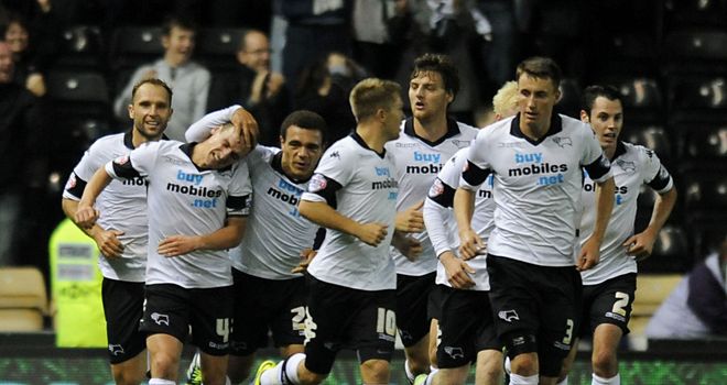 Craig Bryson (second from left): Celebrates late equaliser