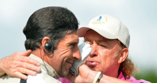 Miguel Angel Jimenez celebrates his foursomes victory with European captain Jose Maria Olazabal