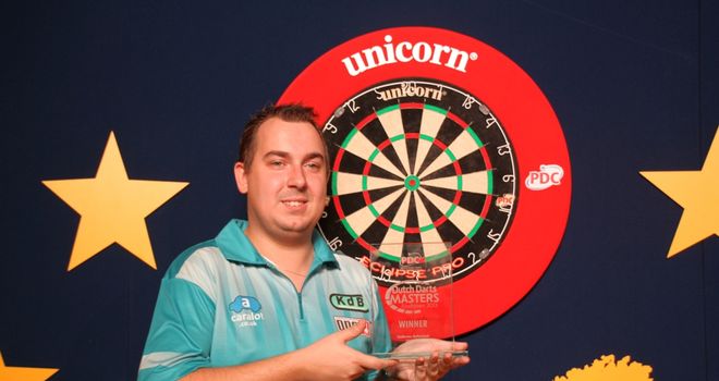 Kim Huybrechts celebrates his Dutch Darts Masters title (Picture by Carsten Arlt, PDC Europe)