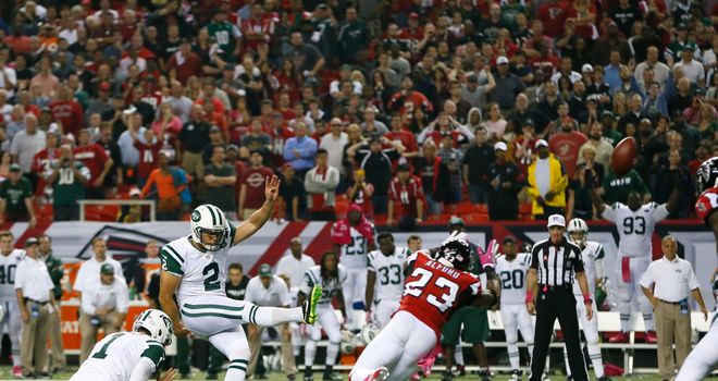 Nick Folk kicks the game-winning field goal for the New York Jets