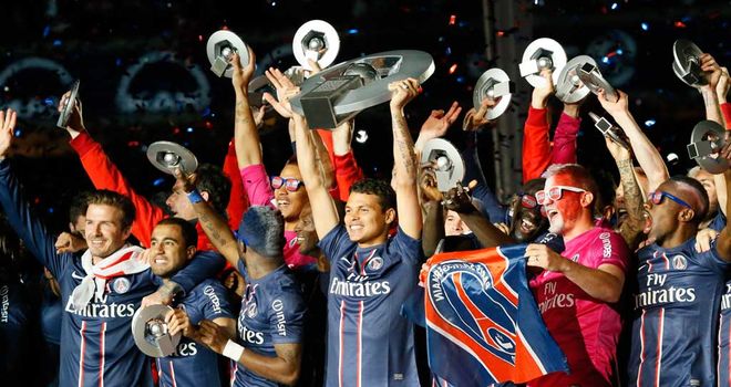 PSG players celebrate winning the Ligue 1 title in May