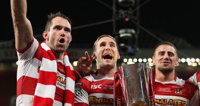 Pat Richards, Sam Tomkins and Michael McIlorum pose with the Super League trophy