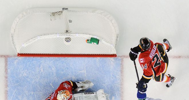 Mike Santorelli celebrates scoring the overtime winner