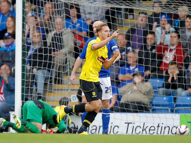 Adam McGurk celebrates his second goal for Burton at Chesterfield