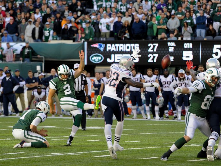 Nick Folk kicks the winning field goal for the Jets