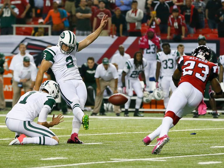 Nick Folk kicks the game-winning field goal for the New York Jets