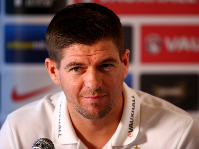 Steven Gerrard faces the press.