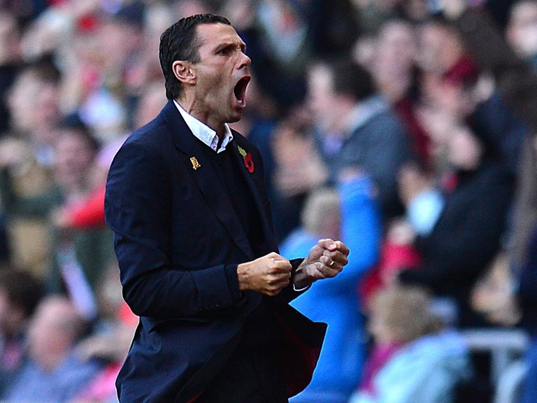 Gus Poyet celebrates as Sunderland beat Newcastle.