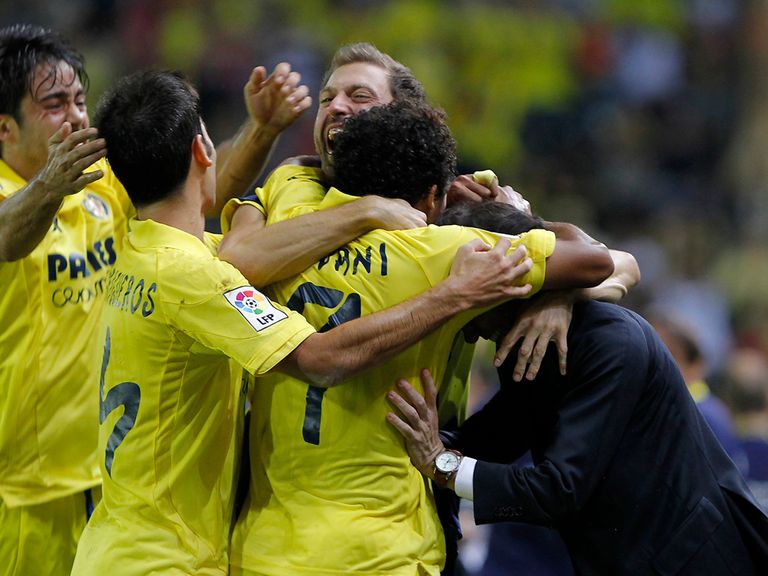 Villarreal players celebrate victory over rivals Valencia
