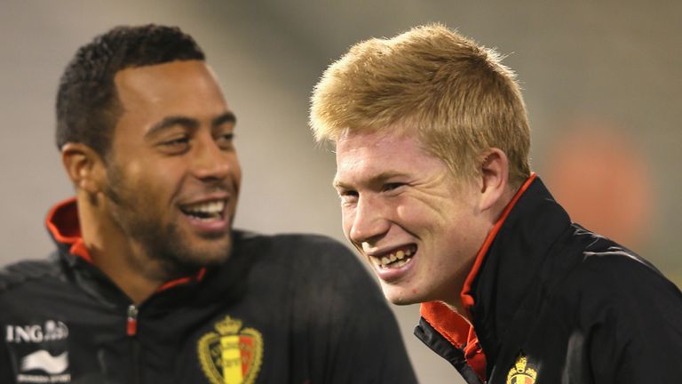 Kevin De Bruyne (right): Sharing a joke with Moussa Dembele