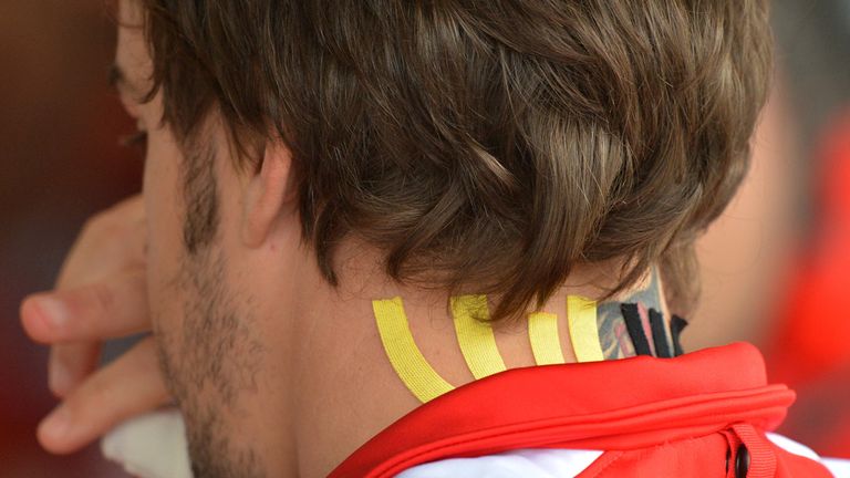 Fernando Alonso: Had his back taped in Austin