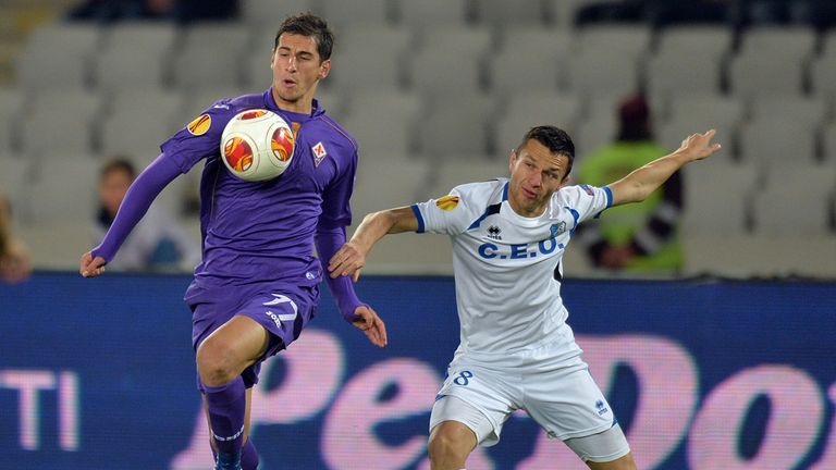 Joaquin and Bogdan Unguruan battle for the ball