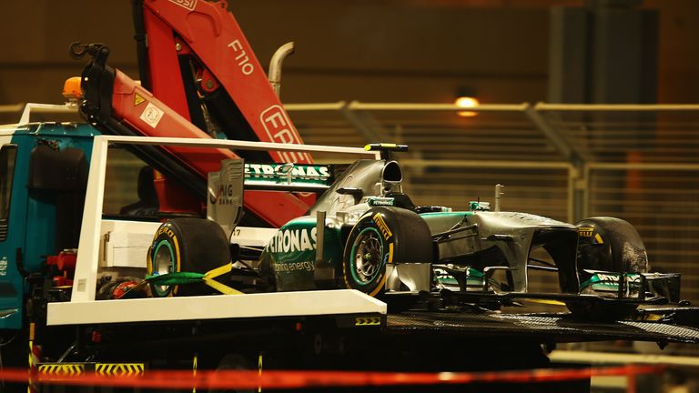 Lewis Hamilton's car is recovered after his qualy spin
