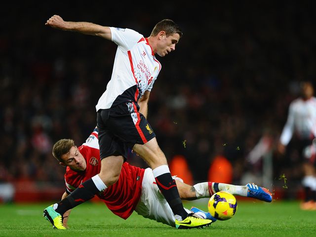 Ramsey tackles Henderson