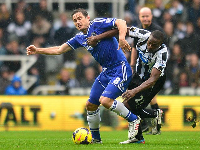 Frank Lampard and Shola Ameobi tangle.