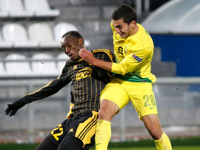 Anzhi Makhachkala's Serder Serderov vies with FC Sheriff Tiraspol's Djibril Paye