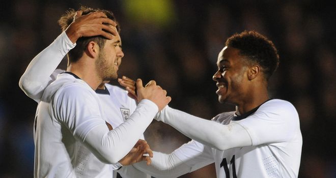 Carl Jenkinson: Celebrates as one of seven different goalscorers