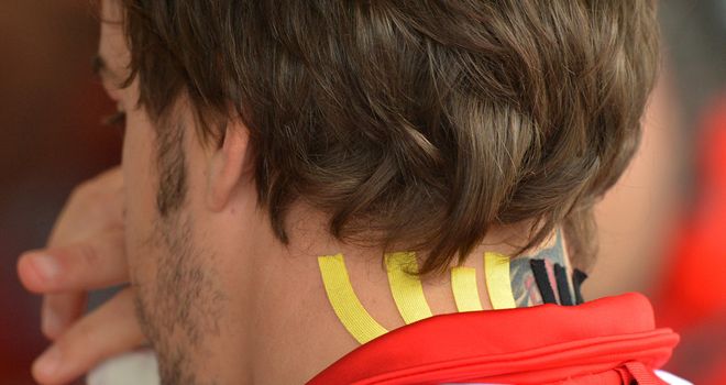 Fernando Alonso: Had his back taped in Austin