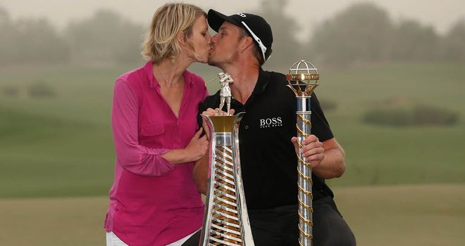 Henrik Stenson and his wife Emma celebrate Race to Dubai victory