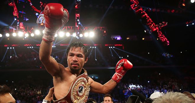 Manny Pacquiao celebrates victory over Brandon Rios