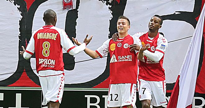 Nicolas De Preville and Reims celebrate.