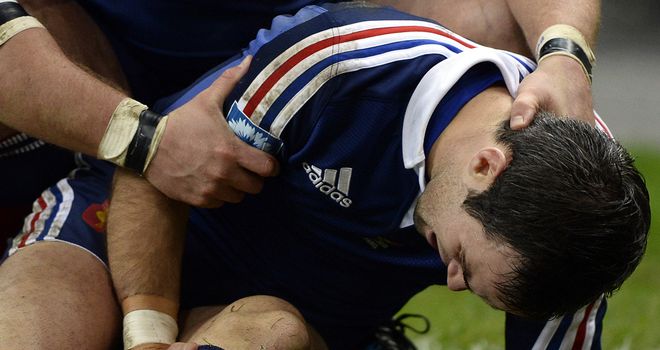 Morgan Parra clutches his knee after being hurt against the Springboks