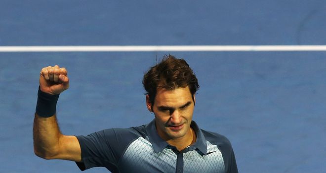 Roger Federer celebrates victory against Richard Gasquet