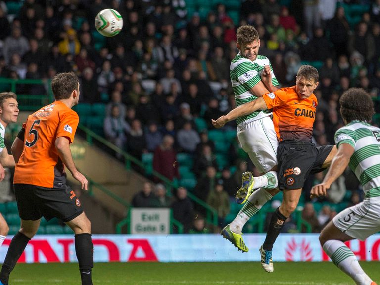 Charlie Mulgrew scores Celtic's late equaliser against Dundee United.