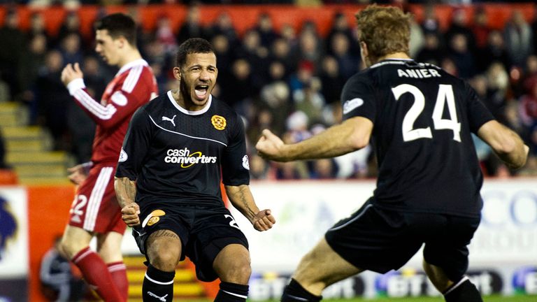 Lionel Ainsworth celebrates after scoring the goal which took Motherwell second in the table