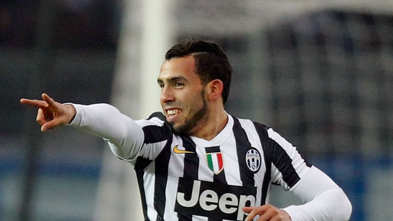 Carlos Tevez celebrates scoring for Juventus