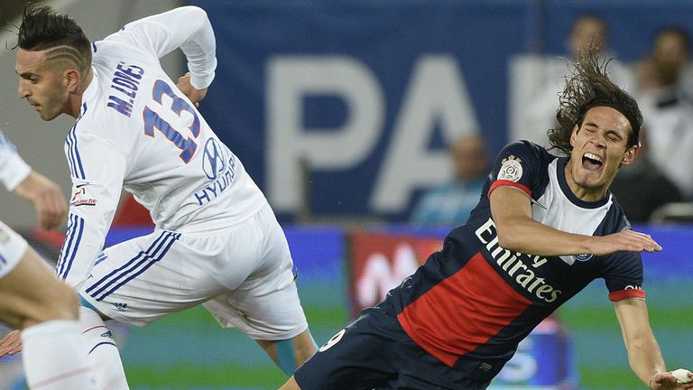 Edinson Cavani takes a tumble.