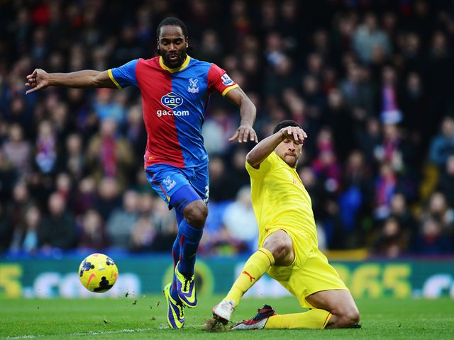 Cameron Jerome tries to skip past Steven Caulker