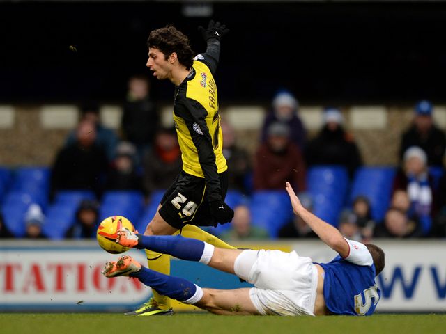 Tommy Smith slides in on Diego Fabbrini