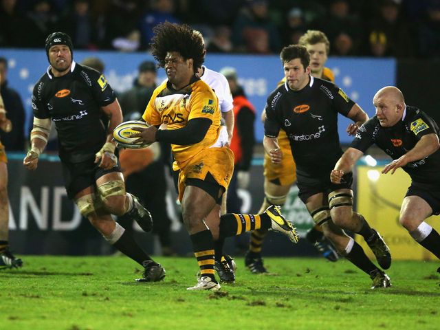 Ashley Johnson of Wasps breaks with the ball