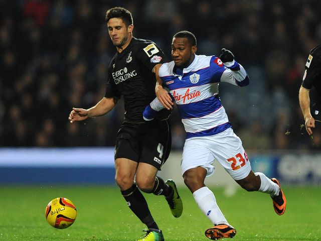 Andrew Surman and Junior Hoilett battle for the ball