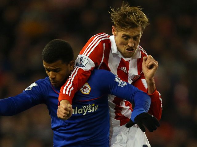 Fraizer Campbell holds off Peter Crouch