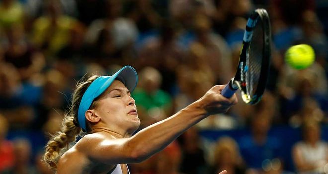 Canada's rising star Eugenie Bouchard crunches a forehand during her victory over Sam Stosur