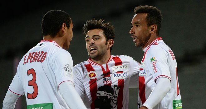 Eduardo (centre) celebrates his late Ajaccio equaliser