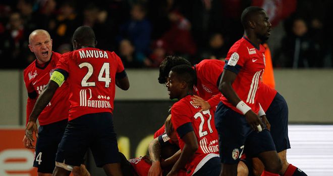Lille celebrate Nolan Roux's late winner