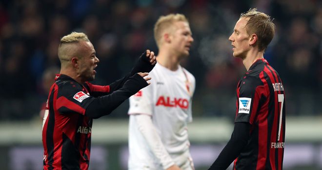 Jan Rosenthal (r) is congratulated on his equaliser by Stephan Schroeck